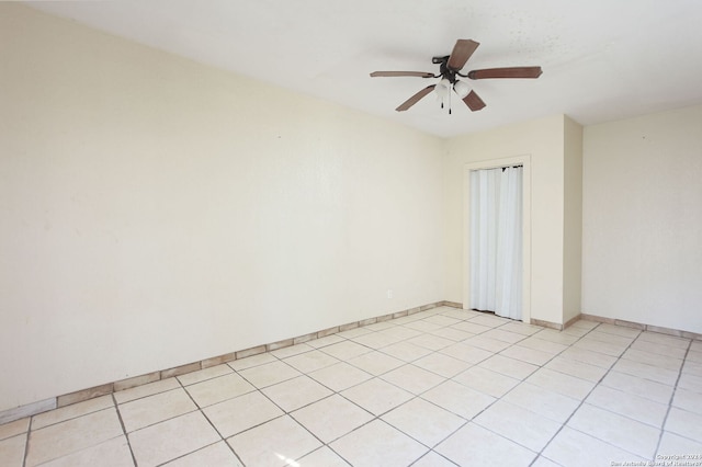620 County Road 6846, Lytle, TX 78052 - unfurnished room with light tile patterned floors, ceiling fan, and baseboards