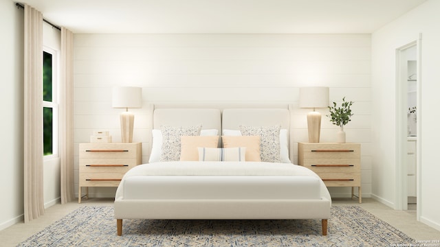 bedroom featuring carpet floors and baseboards