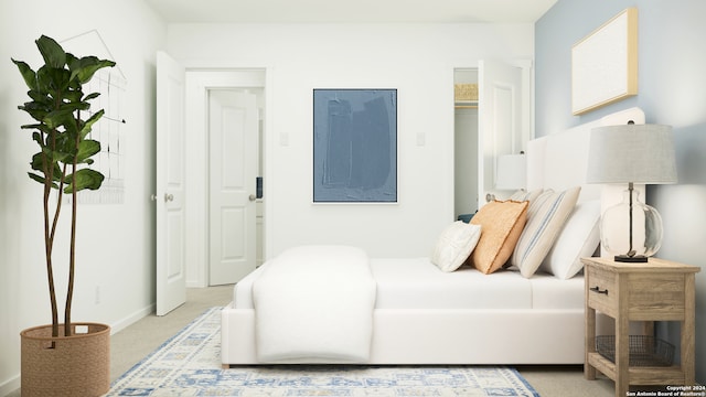 bedroom with baseboards and light colored carpet