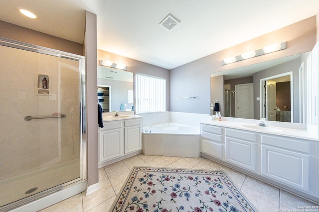 full bath with a garden tub, visible vents, a stall shower, vanity, and tile patterned floors