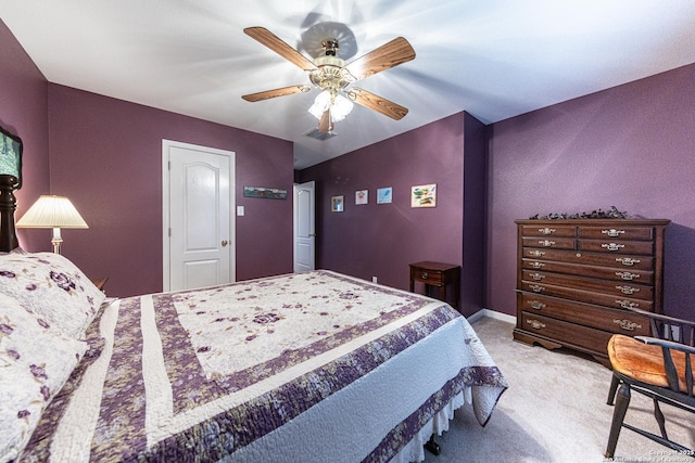 bedroom featuring baseboards, ceiling fan, visible vents, and carpet flooring