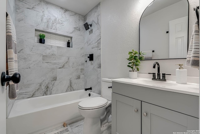 full bath featuring toilet, bathing tub / shower combination, and vanity