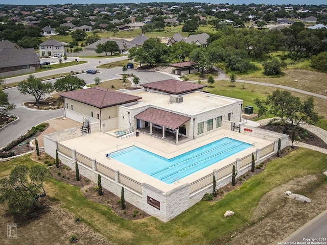 view of pool featuring a patio, fence, and a fenced in pool