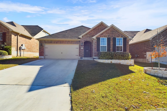 ranch-style home featuring driveway, brick siding, a front lawn, and an attached garage