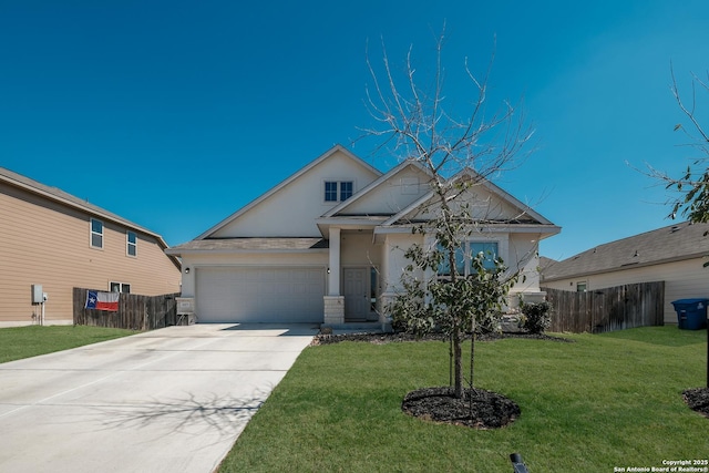 view of front of house featuring concrete driveway, an attached garage, fence, a front yard, and stucco siding