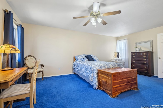 bedroom with carpet floors, a ceiling fan, and baseboards