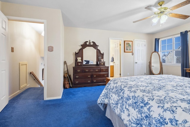 bedroom featuring carpet, ceiling fan, and ensuite bathroom