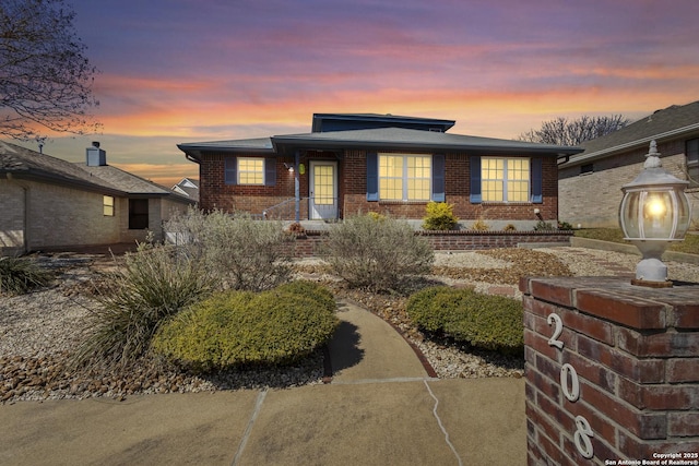 view of front facade with brick siding