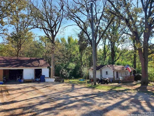 view of side of property with an outbuilding