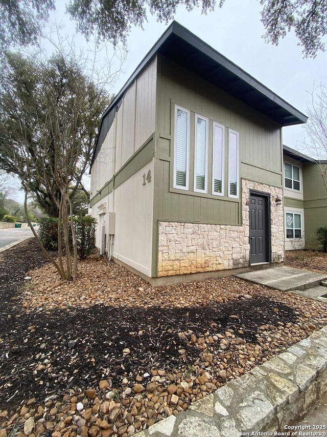 view of home's exterior with stone siding