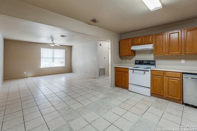 kitchen with light countertops, visible vents, white electric range, dishwasher, and under cabinet range hood