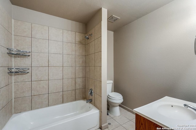 bathroom featuring visible vents, toilet, shower / tub combination, tile patterned floors, and vanity