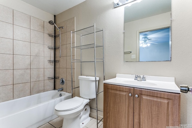 bathroom with shower / washtub combination, vanity, toilet, and tile patterned floors