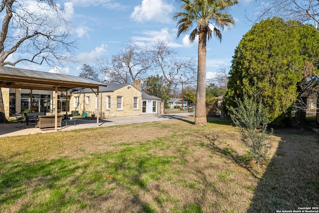 view of yard featuring a patio area, outdoor lounge area, and a gazebo