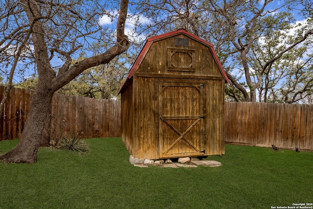 view of shed featuring a fenced backyard