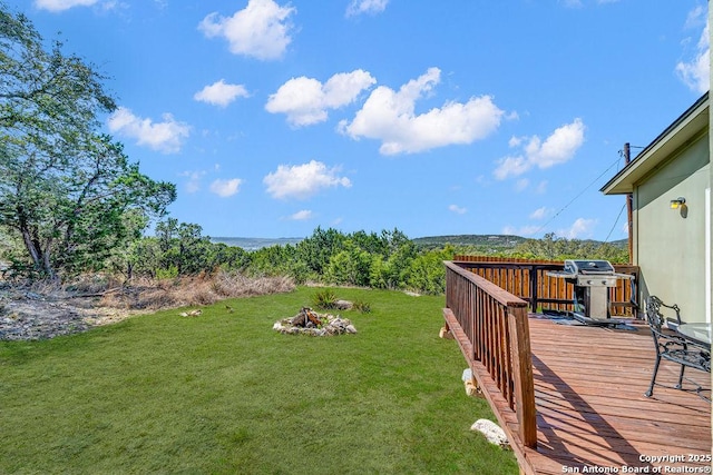 view of yard with a deck