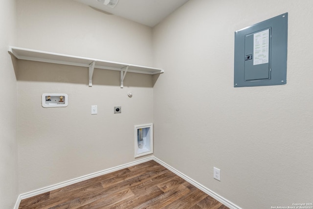 clothes washing area with laundry area, electric panel, dark wood-type flooring, hookup for a washing machine, and electric dryer hookup