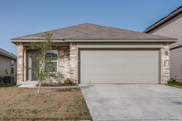 ranch-style home featuring an attached garage, driveway, and brick siding