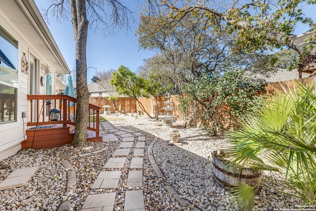 view of yard with a fenced backyard