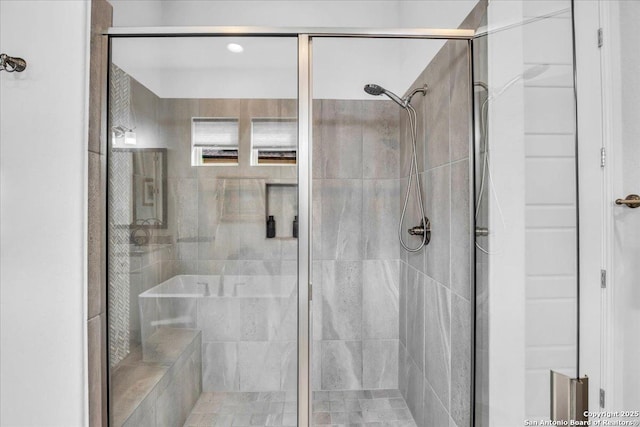 full bath featuring a shower stall