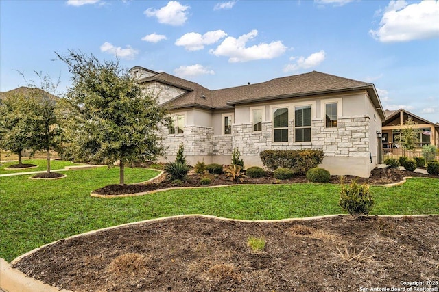 exterior space featuring stone siding, a front lawn, and stucco siding