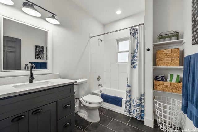 bathroom with toilet, tile patterned flooring, shower / bath combo, and vanity