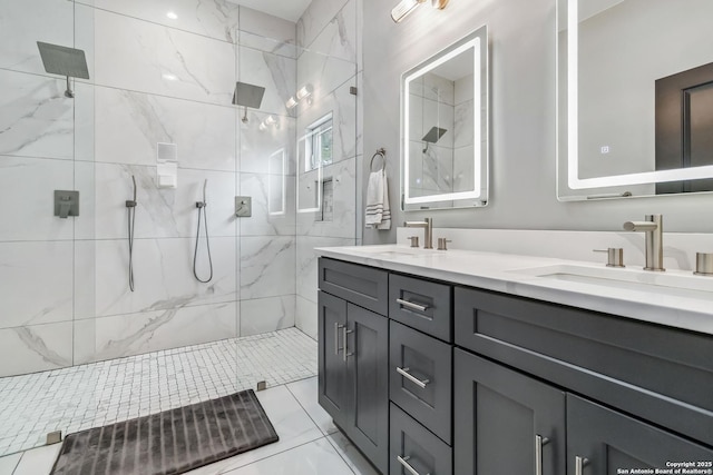 full bathroom featuring double vanity, a sink, and a marble finish shower