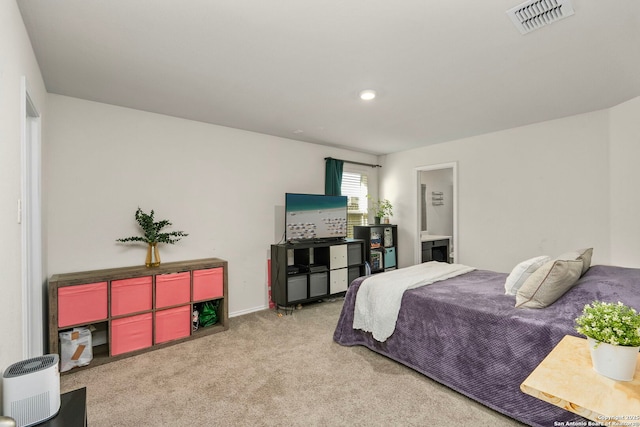 carpeted bedroom with visible vents