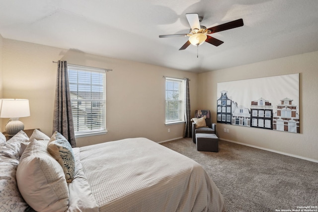 bedroom with carpet, baseboards, and a ceiling fan