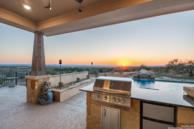 view of patio / terrace with a grill and area for grilling