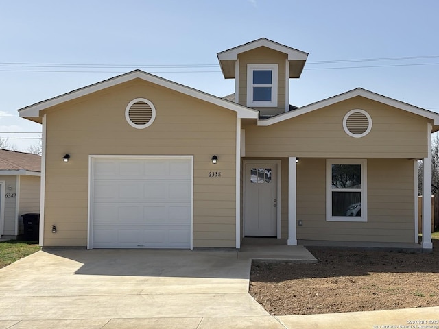 view of front of house featuring driveway and an attached garage