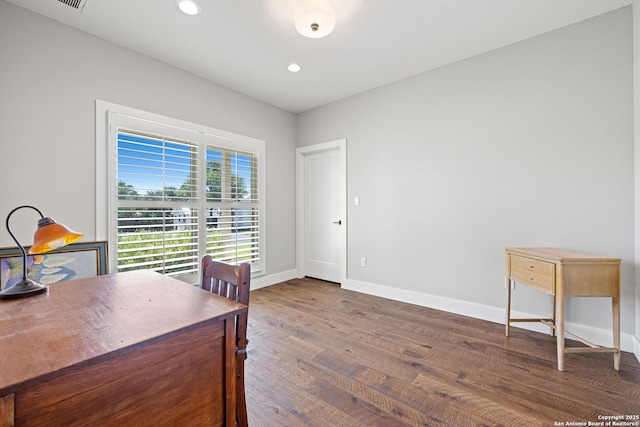 home office featuring baseboards, wood finished floors, and recessed lighting