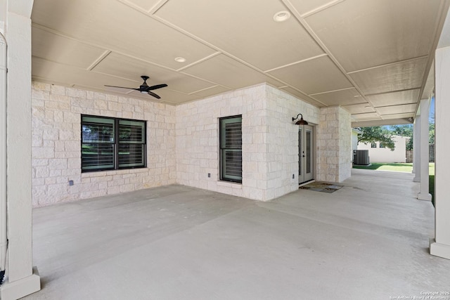 view of patio with a ceiling fan and cooling unit