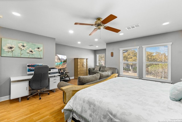 bedroom with baseboards, visible vents, ceiling fan, light wood-type flooring, and recessed lighting