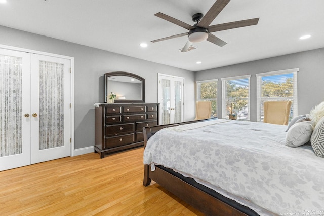 bedroom with french doors, recessed lighting, a ceiling fan, wood finished floors, and baseboards