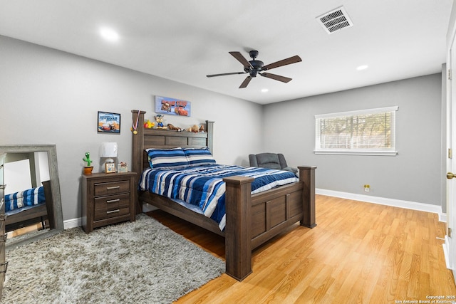 bedroom featuring light wood finished floors, baseboards, visible vents, a ceiling fan, and recessed lighting