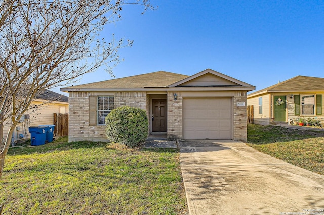 ranch-style house featuring a garage, driveway, brick siding, and a front yard