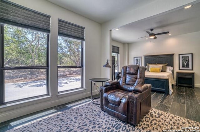 bedroom featuring dark wood-style flooring, recessed lighting, and baseboards