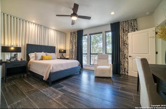 bedroom with a ceiling fan, recessed lighting, and dark wood finished floors