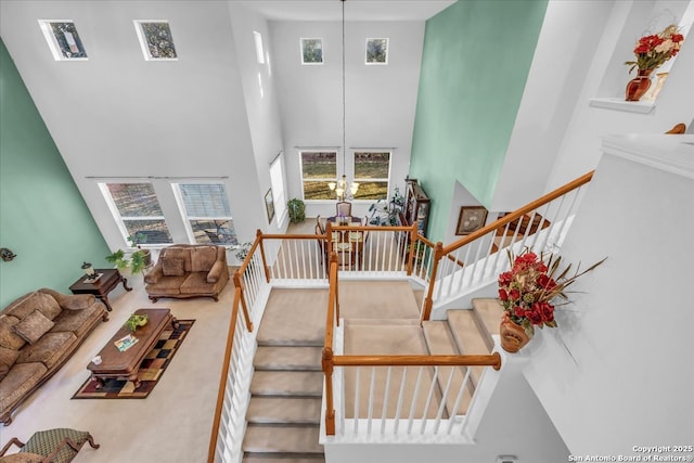 interior space featuring a high ceiling and a wealth of natural light