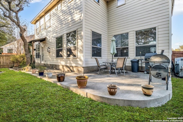 view of patio / terrace featuring fence