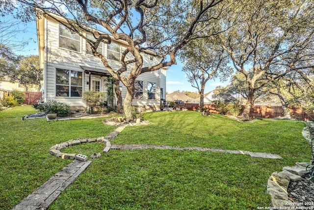 view of yard featuring fence