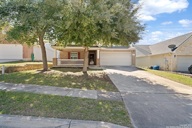 view of front of home featuring brick siding, a porch, concrete driveway, an attached garage, and a front lawn