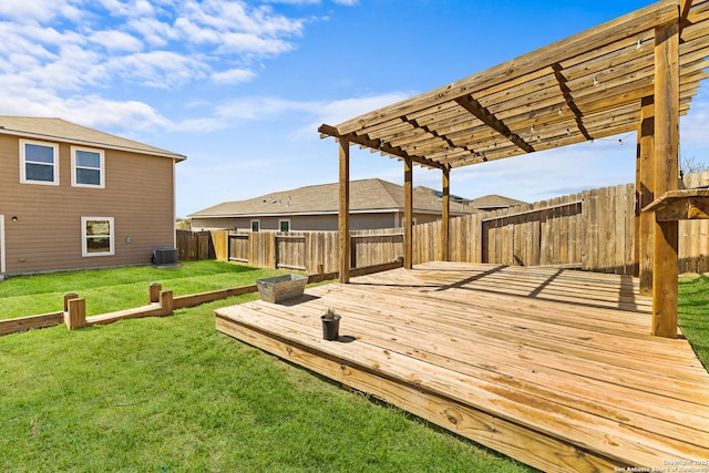 deck with cooling unit, a fenced backyard, a lawn, and a pergola