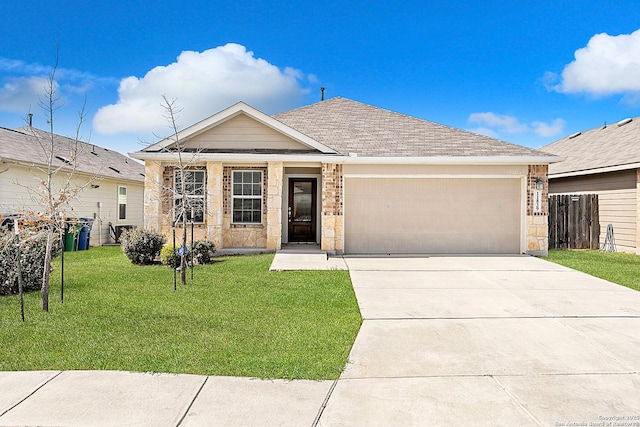 ranch-style house featuring an attached garage, a shingled roof, fence, concrete driveway, and a front yard