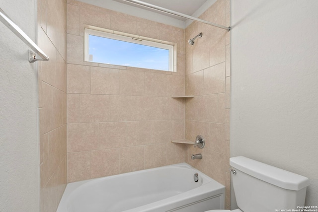 full bathroom with toilet and tub / shower combination