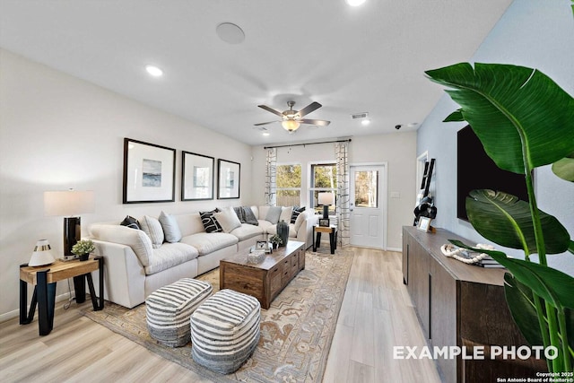 living room with light wood-style flooring, recessed lighting, visible vents, baseboards, and a ceiling fan