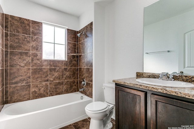 full bath with vanity, toilet, tile patterned flooring, and shower / washtub combination