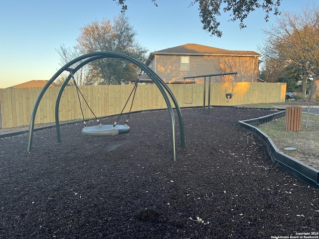 view of play area featuring fence