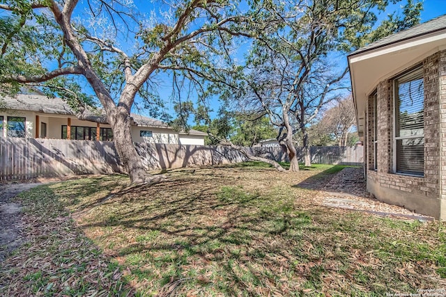 view of yard featuring a fenced backyard